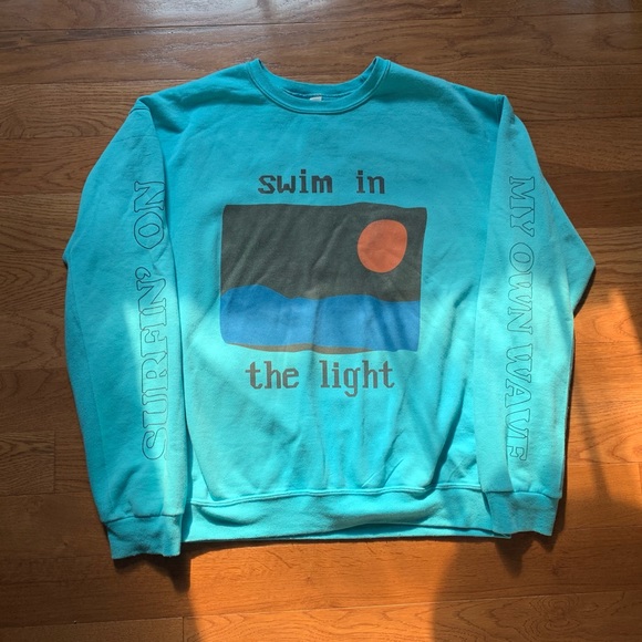 swim in the light sweatshirt